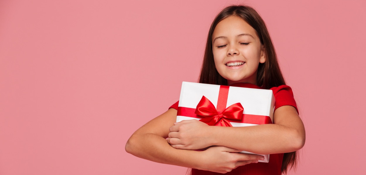 Read more about the article Compras de Natal: 8 dicas de educação financeira para as crianças nessa data!